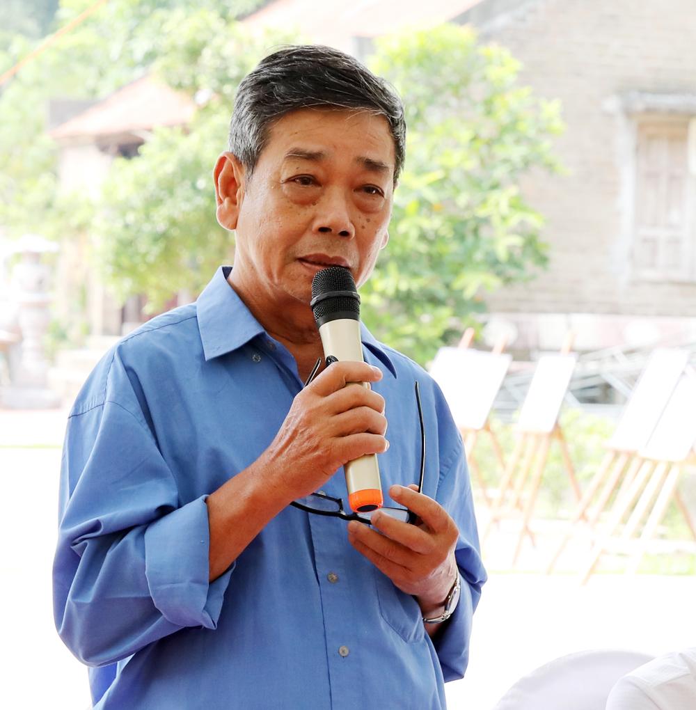 Ông Trần Văn Lạng trao đổi tại hội thảo.
